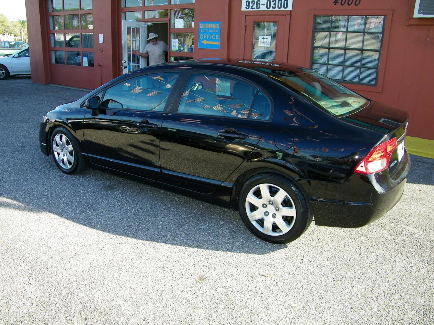 2011 Black /Gray Honda Civic LX Sedan 5-Speed AT (19XFA1F5XBE) with an 1.8L L4 SOHC 16V engine, 5-Speed Automatic transmission, located at 4000 Bee Ridge Road, Sarasota, FL, 34233, (941) 926-0300, 27.298664, -82.489151 - Photo#5